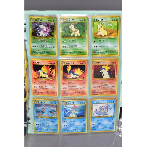 569 - A COMPLETE SET OF POKEMON TEAM ROCKET CARDS, including the 'Secret' Dark Raichu card (83/82), with a... 