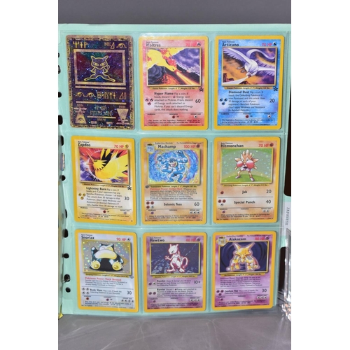 569 - A COMPLETE SET OF POKEMON TEAM ROCKET CARDS, including the 'Secret' Dark Raichu card (83/82), with a... 