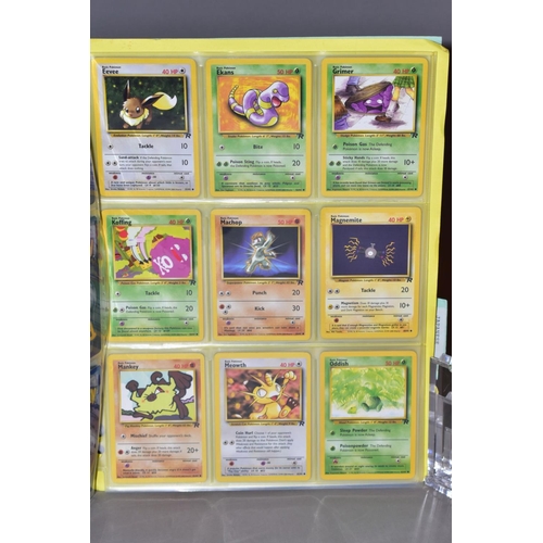 569 - A COMPLETE SET OF POKEMON TEAM ROCKET CARDS, including the 'Secret' Dark Raichu card (83/82), with a... 