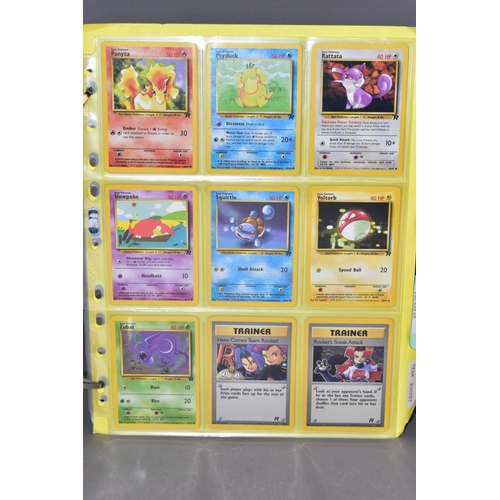 569 - A COMPLETE SET OF POKEMON TEAM ROCKET CARDS, including the 'Secret' Dark Raichu card (83/82), with a... 