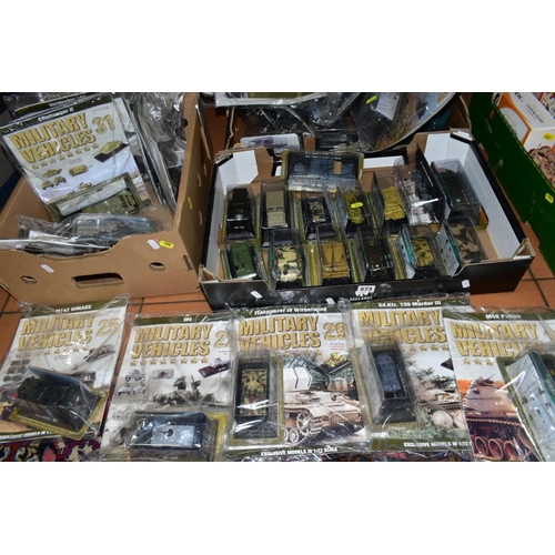 573 - A QUANTITY OF AMER MILITARY VEHICLES COLLECTION MODELS, majority are still sealed in original packag... 