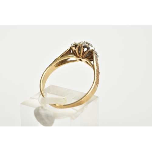 60 - A 9CT GOLD DIAMOND CLUSTER RING, the raised cluster with illusion set single cut diamonds, with text... 