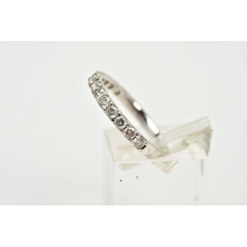 73 - AN 18TH WHITE GOLD DIAMOND HALF ETERNITY RING, designed with a row of thirteen claw set, round brill... 