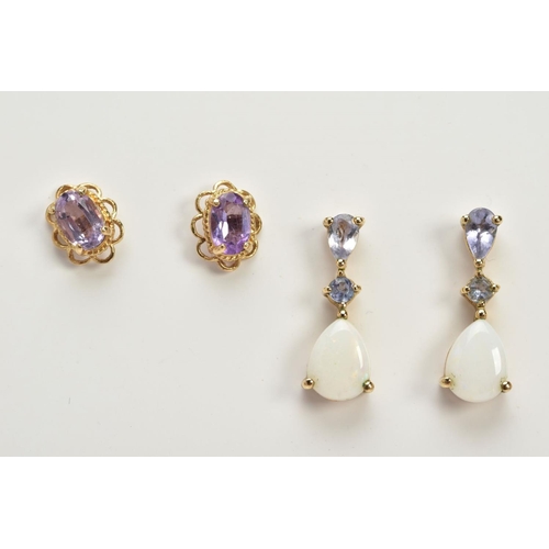 78 - FOUR PAIRS OF YELLOW METAL EARRINGS AND A PENDANT, to include a pair of openwork scroll detailed scr... 