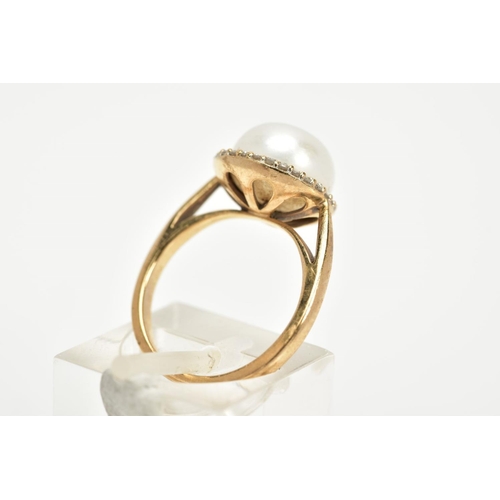 84 - A YELLOW METAL PEARL AND DIAMOND RING, designed with a central cultured pearl, within a single cut d... 