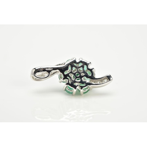 89 - A 9CT WHITE GOLD EMERALD AND DIAMOND PENDANT, in the form of a flower, set with a central circular c... 