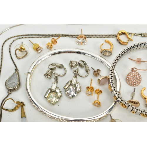 106 - A SELECTION OF JEWELLERY, to include two white metal bangles, a white metal cross pendant set with s... 