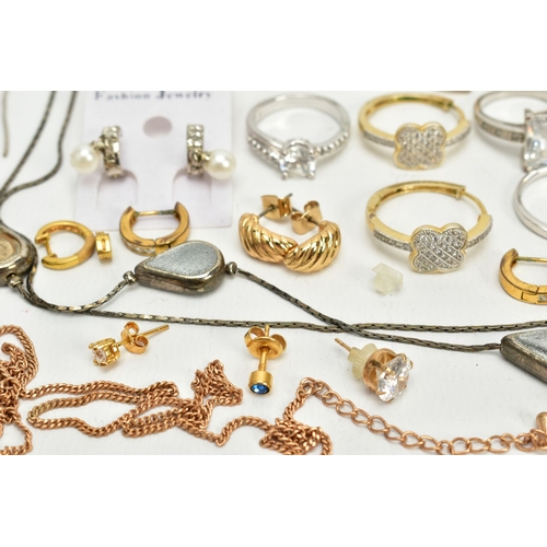 106 - A SELECTION OF JEWELLERY, to include two white metal bangles, a white metal cross pendant set with s... 