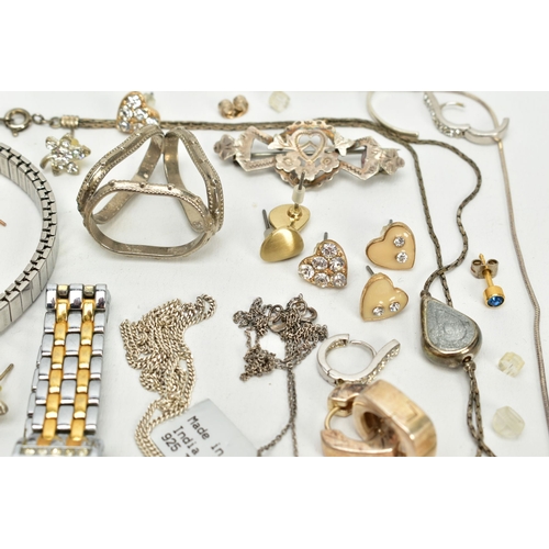 106 - A SELECTION OF JEWELLERY, to include two white metal bangles, a white metal cross pendant set with s... 