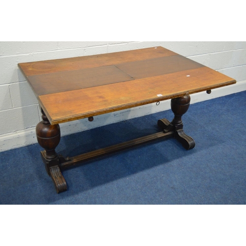 1266 - A SLIM RUSTIC OAK TABLE, together with two similar spinning chairs, ash tray and an oak torchere sta... 