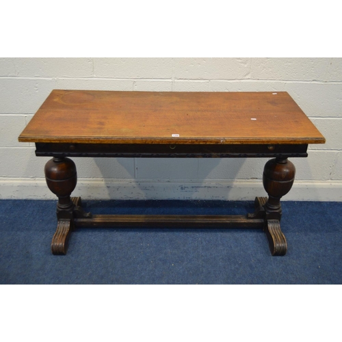 1266 - A SLIM RUSTIC OAK TABLE, together with two similar spinning chairs, ash tray and an oak torchere sta... 