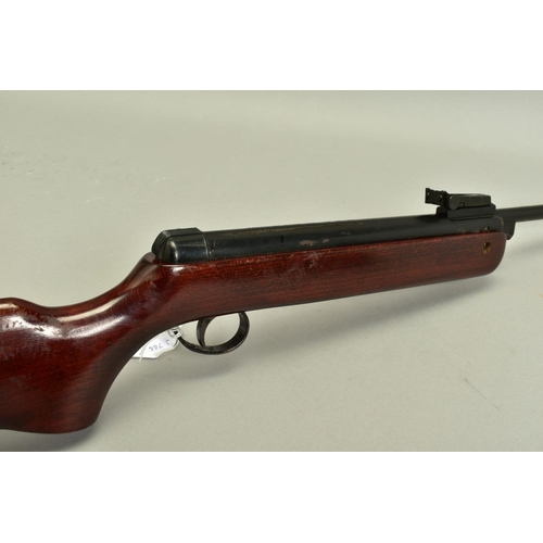 279 - A .22'' B.S.A. METEOR MK IV AIR RIFLE, serial number TG11797, its action and barrel have a black jap... 