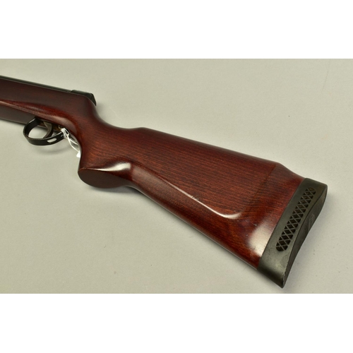 279 - A .22'' B.S.A. METEOR MK IV AIR RIFLE, serial number TG11797, its action and barrel have a black jap... 