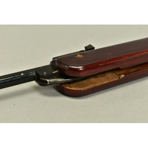 279 - A .22'' B.S.A. METEOR MK IV AIR RIFLE, serial number TG11797, its action and barrel have a black jap... 