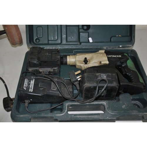 A HITACHI DH24DBC 24V SDS DRILL with case charger and two batteries and a Cruesen Professional benc