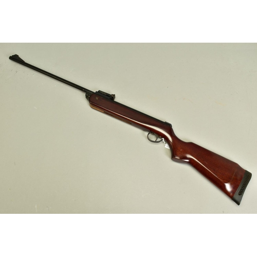 279 - A .22'' B.S.A. METEOR MK IV AIR RIFLE, serial number TG11797, its action and barrel have a black jap... 
