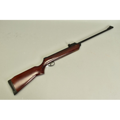 279 - A .22'' B.S.A. METEOR MK IV AIR RIFLE, serial number TG11797, its action and barrel have a black jap... 