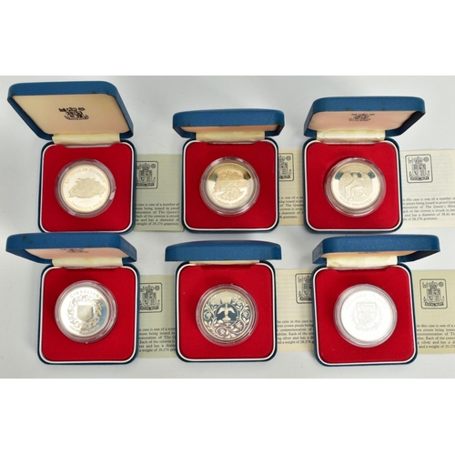 1 - A SET OF SIX INDIVIDUALLY CASED 1952-1977 COMMEMORATIVE COINS, each with a design of the issuing cou... 