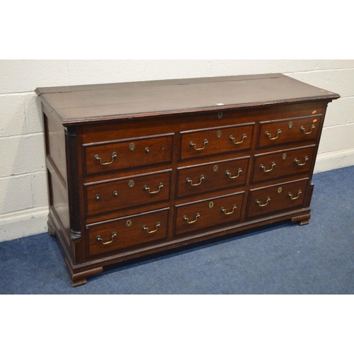 1343 - A GEORGE III OAK AND MAHOGANY CROSSBANDED MULE CHEST, with six dummy drawers above three drawers, br... 