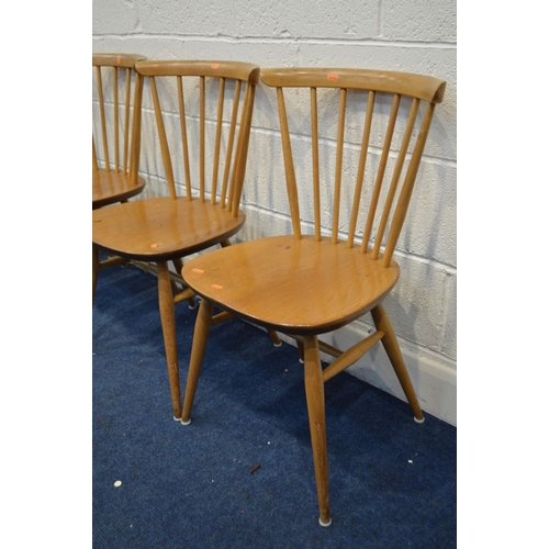 1346 - A BLONDE ERCOL MODEL 383 ELM AND BEECH DROP LEAF DINING TABLE, open length 138cm x closed length 66c... 