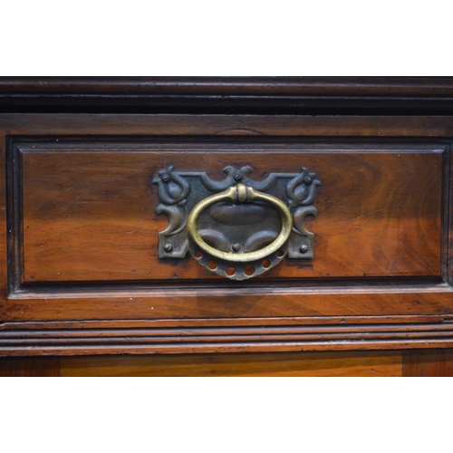 1349 - AN EARLY 20TH CENTURY WALNUT MIRROR BACK SIDEBOARD, foliate decoration, overhanging top supported by... 