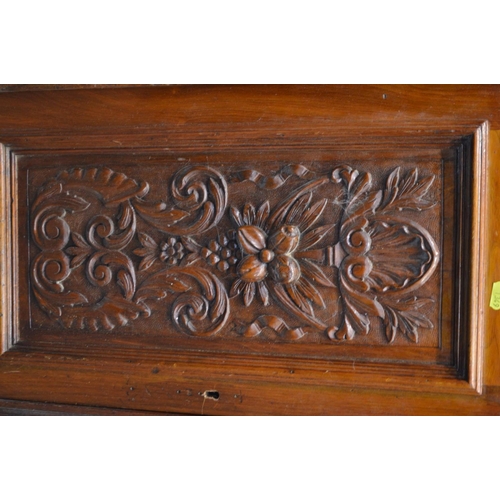 1349 - AN EARLY 20TH CENTURY WALNUT MIRROR BACK SIDEBOARD, foliate decoration, overhanging top supported by... 