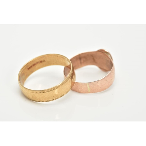 14 - TWO 9CT GOLD RINGS, the first a rose gold belt buckle design with a rubbed foliate decoration, hallm... 