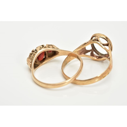 16 - TWO 9CT GOLD RINGS, the first a graduated three stone oval cut garnet ring, within a scroll detailed... 