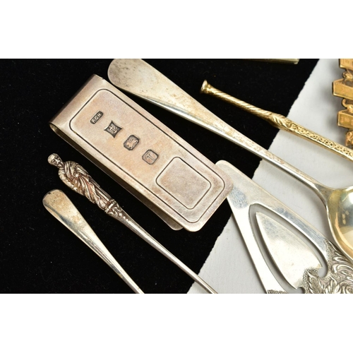 19 - A SMALL QUANTITY OF ITEMS, to include a silver money clip, hallmarked Birmingham, a silver gilt teas... 