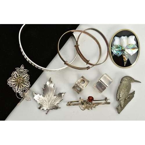 20 - A SELECTION OF WHITE METAL ITEMS, to include a bangle with square detailing all round stamped 925, t... 