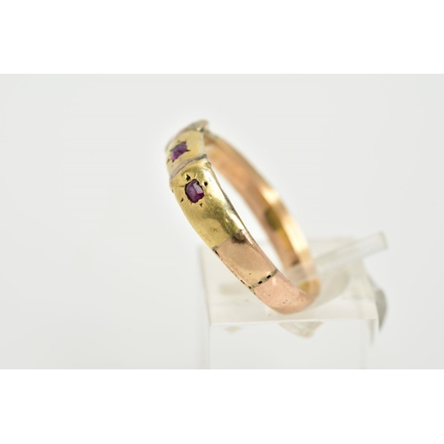 3 - A 15CT GOLD RUBY SET RING, in the form of a buckle, set with two rectangular cut rubies, hallmarked ... 