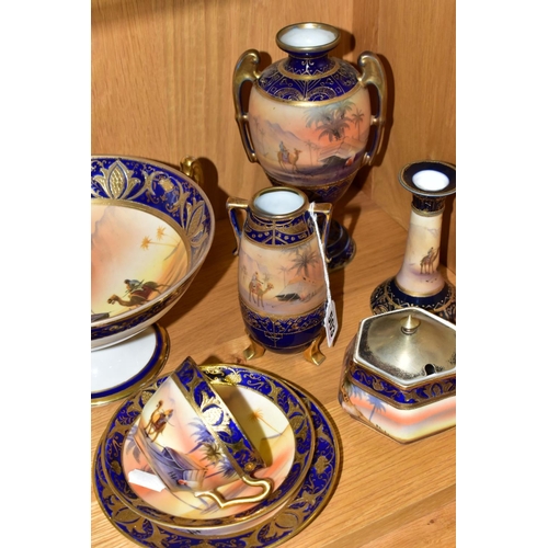 503 - A GROUP OF NORITAKE 'DESERT' SCENED ITEMS, two twin handled vases, height 14cm and pedestal vase, he... 