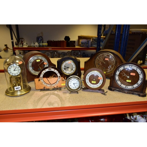 507 - NINE VARIOUS 20TH CENTURY CLOCKS AND TIMEPIECES, including a Kundo anniversary clock, a Smiths brown... 