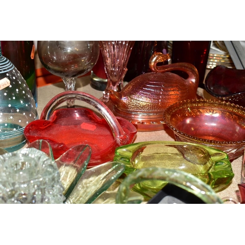 510 - A GROUP OF GLASSWARE INCLUDING COLOURED ITEMS, two ships in bottles, various modern paperweights, gl... 