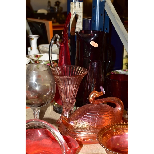 510 - A GROUP OF GLASSWARE INCLUDING COLOURED ITEMS, two ships in bottles, various modern paperweights, gl... 