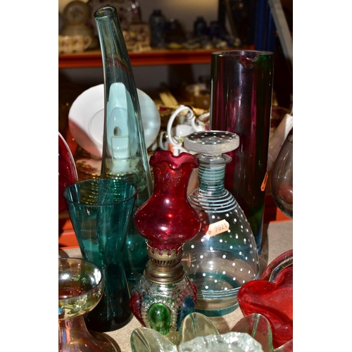 510 - A GROUP OF GLASSWARE INCLUDING COLOURED ITEMS, two ships in bottles, various modern paperweights, gl... 