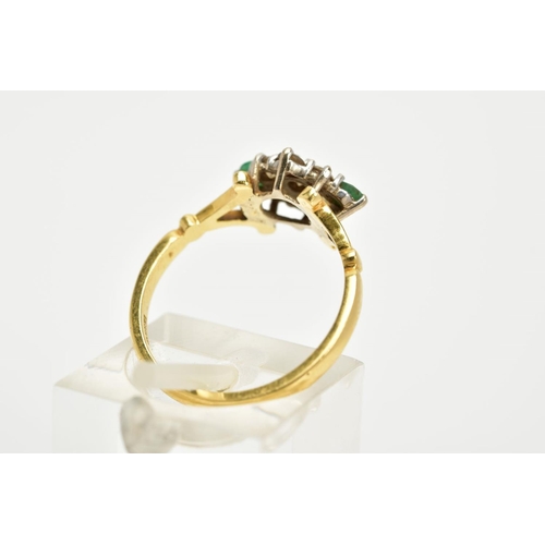 68 - AN 18CT GOLD, DIAMOND AND EMERALD CLUSTER RING, designed as a lozenge shape set with seven round bri... 