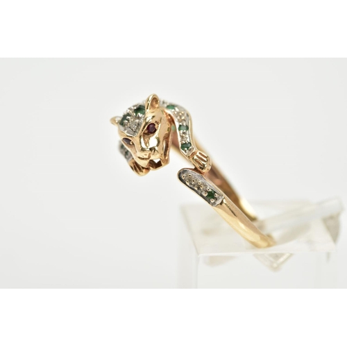 69 - A 9CT GOLD, EMERALD AND DIAMOND PANTHER RING, in the form of a leaping panther set with a circular c... 