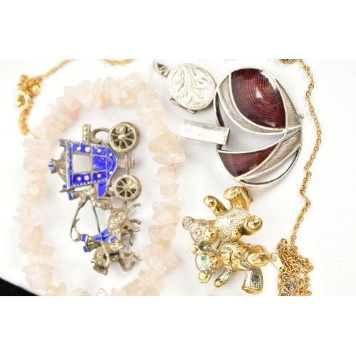 32 - A SELECTION OF JEWELLERY, to include a pair of yellow metal crystal embellished hoop earrings, post ... 