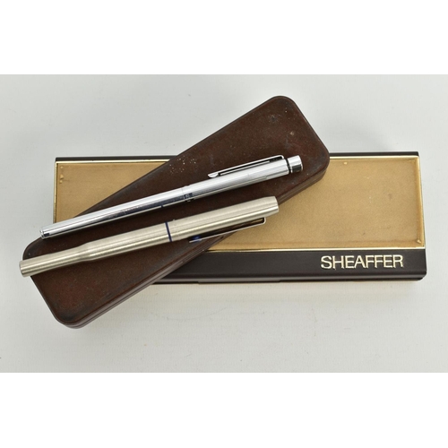 37 - A BALL POINT PARKER PEN AND A SHAFFER FOUNTAIN PEN, a cased parker 25 stainless steel, together with... 