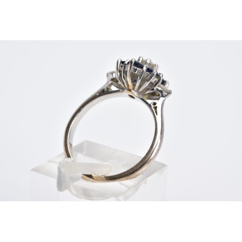 104 - AN 18CT WHITE GOLD DIAMOND AND SAPPHIRE CLUSTER RING, the raised cluster designed with a central rou... 