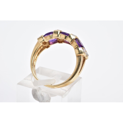 11 - A 9CT GOLD AMETHYST AND DIAMOND HALF HOOP RING, designed with three columns each set with two oval c... 