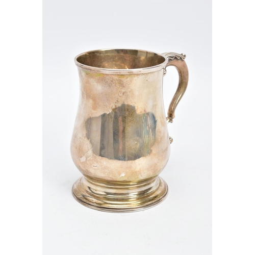 2 - A SILVER GEORGE III TANKARD, of a plain polished design, bell shaped body on a circular base with a ... 