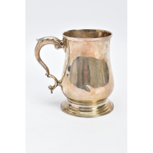 2 - A SILVER GEORGE III TANKARD, of a plain polished design, bell shaped body on a circular base with a ... 