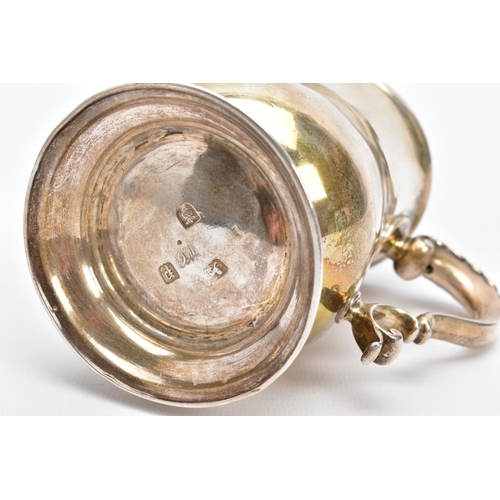 2 - A SILVER GEORGE III TANKARD, of a plain polished design, bell shaped body on a circular base with a ... 