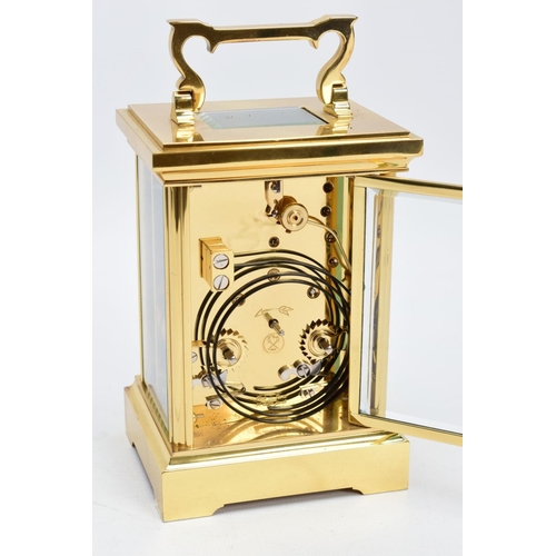 20 - A WOODFORD ENGLISH BRASS STRIKING CARRIAGE CLOCK, white dial with Brequet style hands, Roman numeral... 