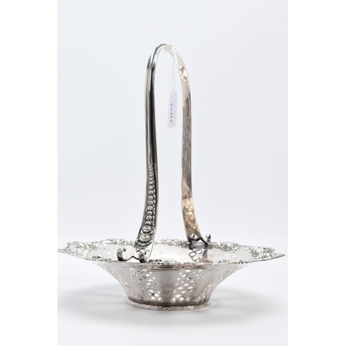 24 - A TIFFANY & CO STERLING SILVER BASKET, with an openwork rose and rose bud detailed surround and elon... 