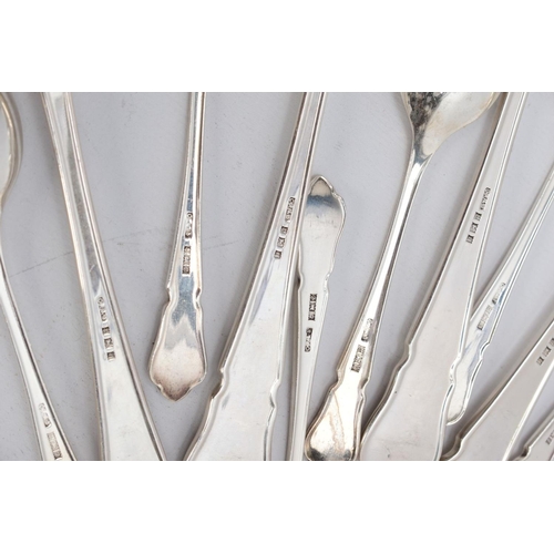 35 - A SELECTION  OF SILVER SPOONS, all of a reeded design to include six soup spoons, five tablespoons, ... 