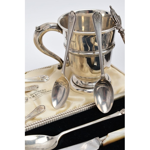 36 - A SELECTION OF SILVER ITEMS, to include a silver cup with a scroll handle hallmarked Birmingham 1938... 