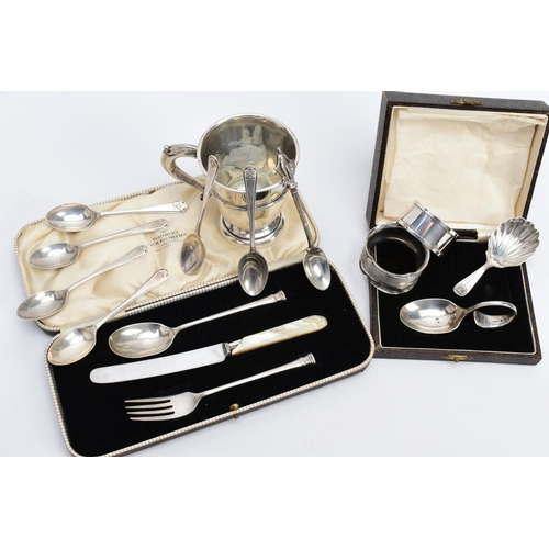 36 - A SELECTION OF SILVER ITEMS, to include a silver cup with a scroll handle hallmarked Birmingham 1938... 